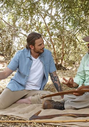 two men talking together